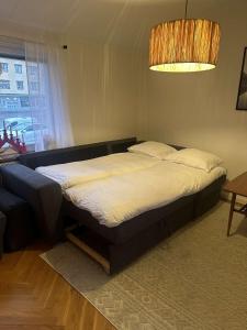 Postel nebo postele na pokoji v ubytování Everglow Living