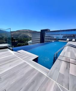 Πισίνα στο ή κοντά στο Estudio chic al costado CLC