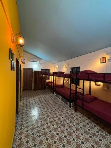 Postel nebo postele na pokoji v ubytování Hungama Hostel & Cafe - By SK