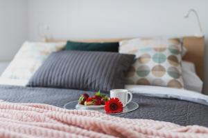 Posteľ alebo postele v izbe v ubytovaní P&O Apartments Wola Tarasy
