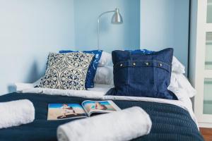Posteľ alebo postele v izbe v ubytovaní P&O Apartments Wola Tarasy