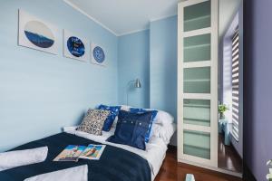 Posedenie v ubytovaní P&O Apartments Wola Tarasy