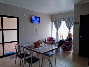 TV a/nebo společenská místnost v ubytování AMARANTA