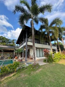 Aed väljaspool majutusasutust Laman Padi Villa in langkawi