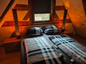Postel nebo postele na pokoji v ubytování Loft auf altem Gutshof ab 2 Nächte