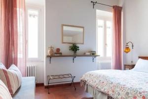Posteľ alebo postele v izbe v ubytovaní Le Stanze Di Santa Croce