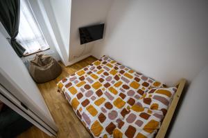 Ένα ή περισσότερα κρεβάτια σε δωμάτιο στο Apartmani RAZVIGORA - DivčiNova