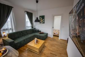 Χώρος καθιστικού στο Apartmani RAZVIGORA - DivčiNova
