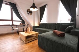 Χώρος καθιστικού στο Apartmani RAZVIGORA - DivčiNova