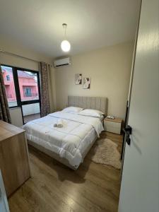 Postel nebo postele na pokoji v ubytování Voyage Apartment