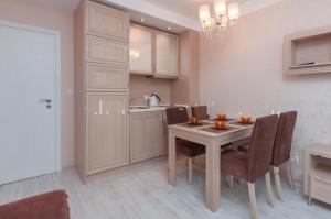 Kuchyň nebo kuchyňský kout v ubytování Monte Carlo