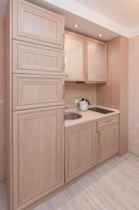 Kuchyň nebo kuchyňský kout v ubytování Monte Carlo