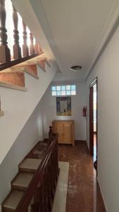 a staircase in a room with a church at Casa Frijol 20metres from the beach in Los Alcázares