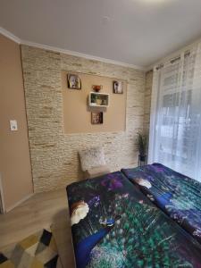 Posteľ alebo postele v izbe v ubytovaní Spirit Apartman - Zalakaros