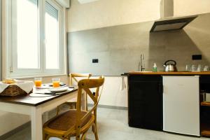 Dapur atau dapur kecil di Residence La Corte - Bilocale 2