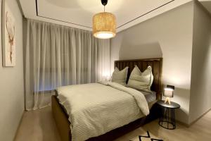 Ένα ή περισσότερα κρεβάτια σε δωμάτιο στο Appartement en résidence Malabata Hills