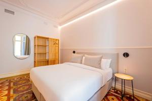 Postel nebo postele na pokoji v ubytování Sweett - Gran Via