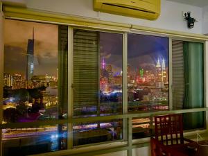 Nespecifikovaný výhled na destinaci Kuala Lumpur nebo výhled na město při pohledu z hostelu