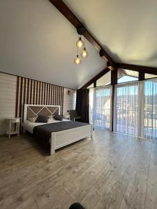 Postel nebo postele na pokoji v ubytování ZARiCHNA HOUSE + 39 fotografií