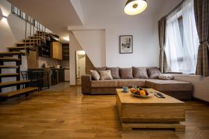 Χώρος καθιστικού στο Apartmani RAZVIGORA - DivčiNova