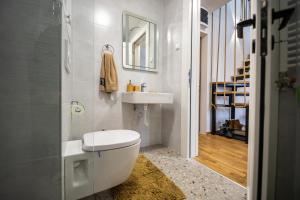 Ένα μπάνιο στο Apartmani RAZVIGORA - DivčiNova