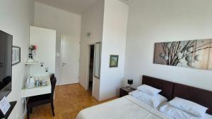 Postel nebo postele na pokoji v ubytování Rooms Tisa Old Town