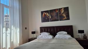 Postel nebo postele na pokoji v ubytování Rooms Tisa Old Town