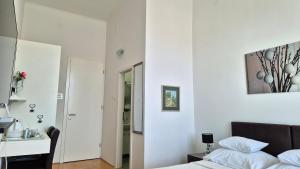 Postel nebo postele na pokoji v ubytování Rooms Tisa Old Town