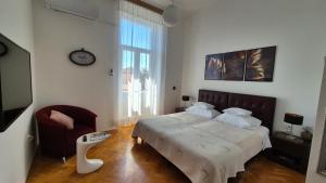 Postel nebo postele na pokoji v ubytování Rooms Tisa Old Town