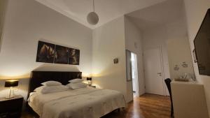 Postel nebo postele na pokoji v ubytování Rooms Tisa Old Town