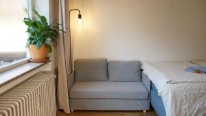 Ένα ή περισσότερα κρεβάτια σε δωμάτιο στο Central Appartment with mountain view