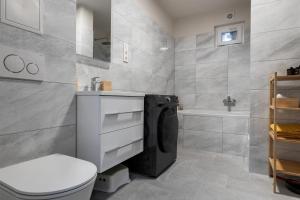 Kúpeľňa v ubytovaní Bem Business Suite + 15 fotografií