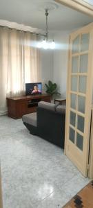 TV a/nebo společenská místnost v ubytování Le soleil