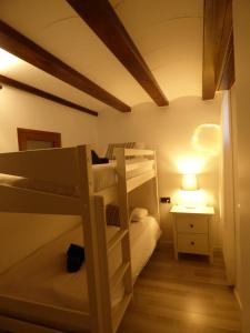 Postel nebo postele na pokoji v ubytování Lo Attic