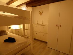Postel nebo postele na pokoji v ubytování Lo Attic