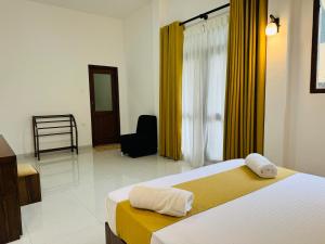 Letto o letti in una camera di Heaven Breeze