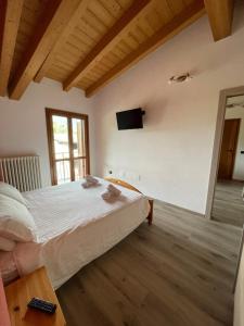 Postel nebo postele na pokoji v ubytování Orobie Holiday Apartments