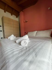 Postel nebo postele na pokoji v ubytování Orobie Holiday Apartments