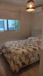 Postel nebo postele na pokoji v ubytování CHAME VIBES Apartamento PB en Playa Caracol Chame