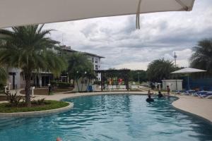 Bazén v ubytování CHAME VIBES Apartamento PB en Playa Caracol Chame nebo v jeho okolí