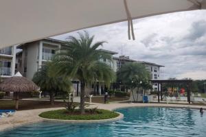 Bazén v ubytování CHAME VIBES Apartamento PB en Playa Caracol Chame nebo v jeho okolí