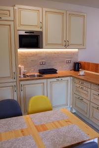 Kuchyň nebo kuchyňský kout v ubytování Apartmán Relax Pernink + 12 fotografií