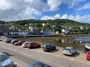 a bunch of cars parked in a parking lot at Bielding View Tarbert Loch Fyne Argyll in Tarbert