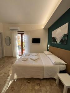Postel nebo postele na pokoji v ubytování B&B Casa Doria