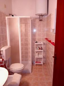 Koupelna v ubytování Appartamento Monolocale La mia Casina di Montagna