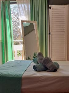 Postel nebo postele na pokoji v ubytování Eleana Apartments