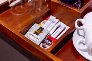 a wooden box filled with differentiatesiatesiatesiatesiatesktop at Mount Seven Holiday Inn in Belihuloya