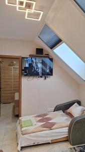 Μια τηλεόραση ή/και κέντρο ψυχαγωγίας στο Betti Lux Apartman