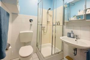 Koupelna v ubytování Cozy Studio Apartment