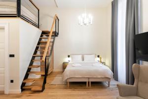 Ένα ή περισσότερα κρεβάτια σε δωμάτιο στο Design Flower Square Apartments